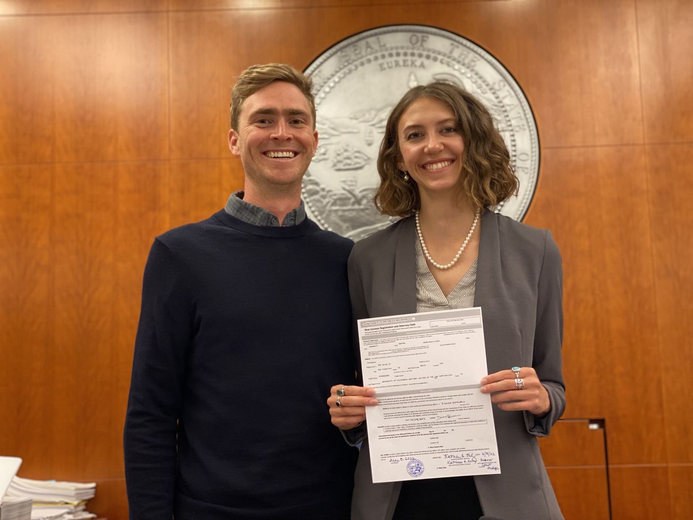 Jack and Danika holding their marriage license